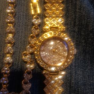 Women gold and diamond watch and bracelet